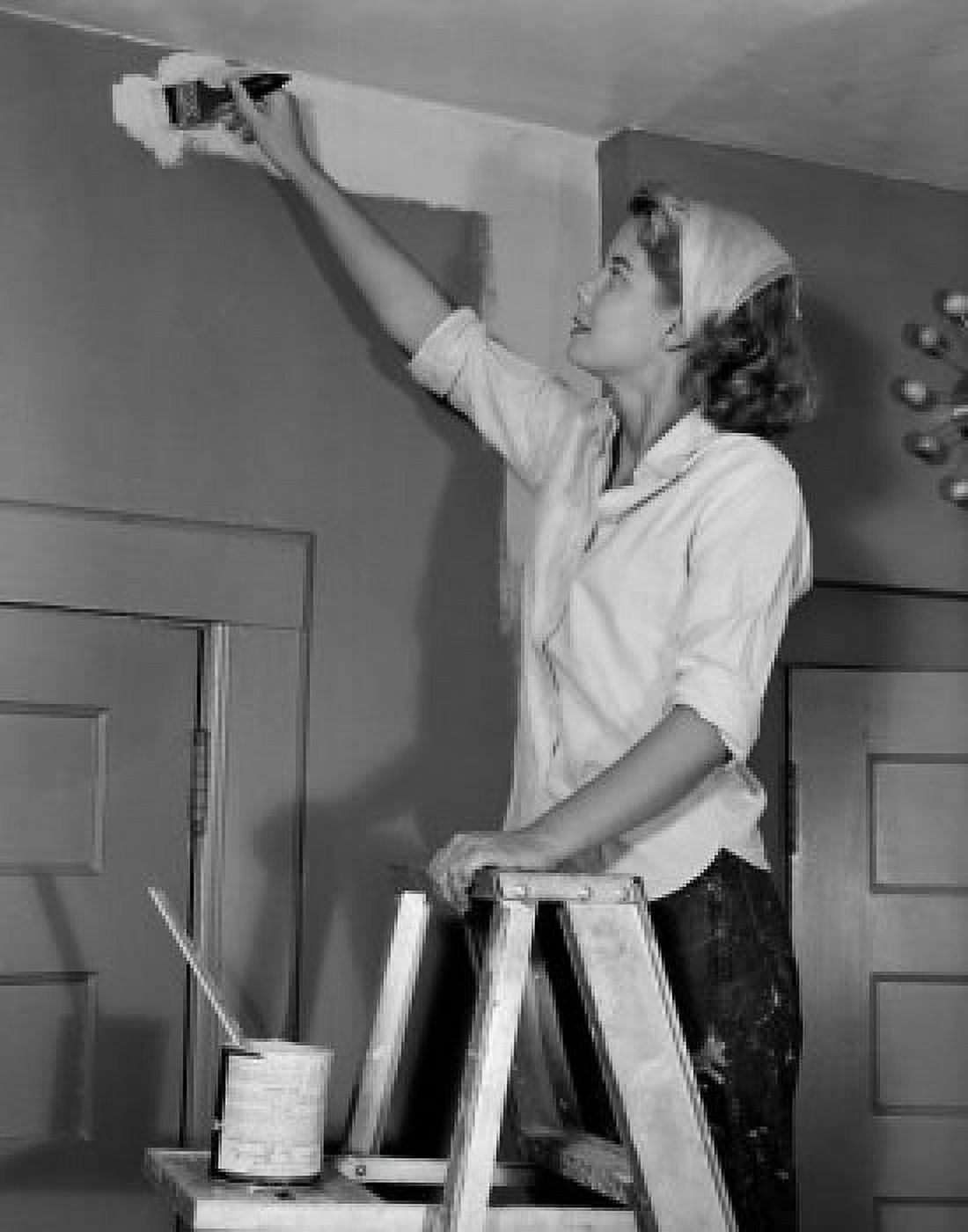 Woman painting wall Canvas Art - (18 x 24)