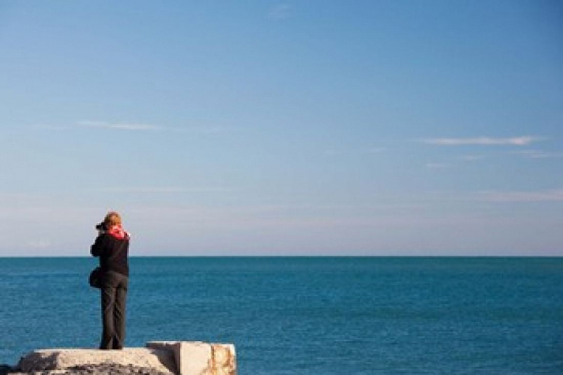 Woman photographing with a camera at Le Cap d Agde Herault Languedoc-Roussillon France Canvas Art - Panoramic Images (36 x 24)