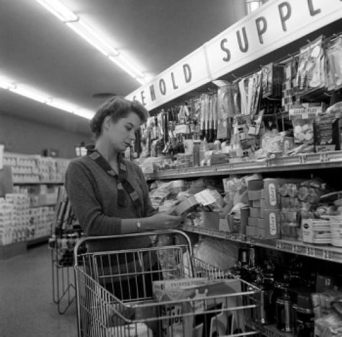Woman shopping in supermarket Canvas Art - (24 x 36)