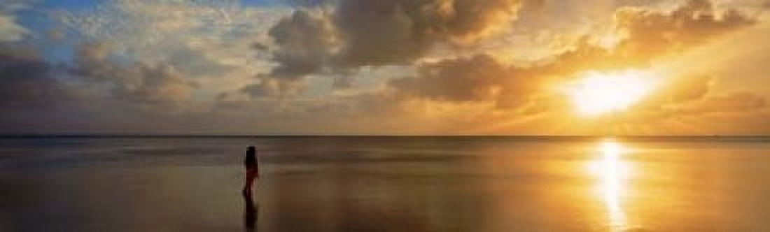 Woman standing on sandbar looking at sunset Aitutaki Cook Islands Canvas Art - Panoramic Images (15 x 5)