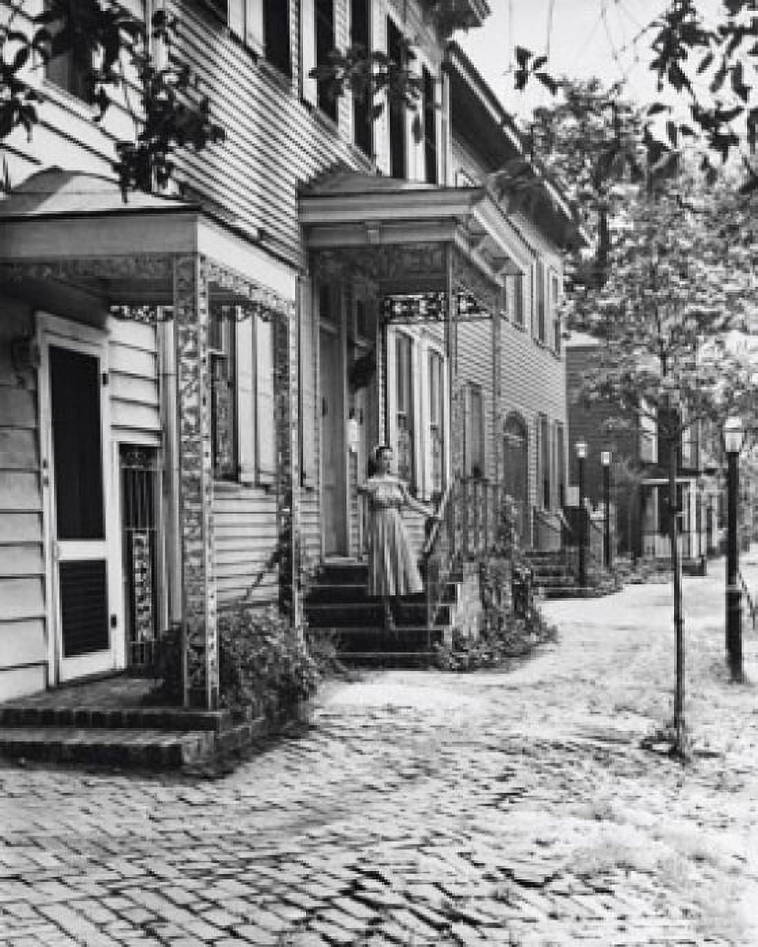 Woman standing on the porch of a house Savannah Georgia USA Canvas Art - (24 x 36)