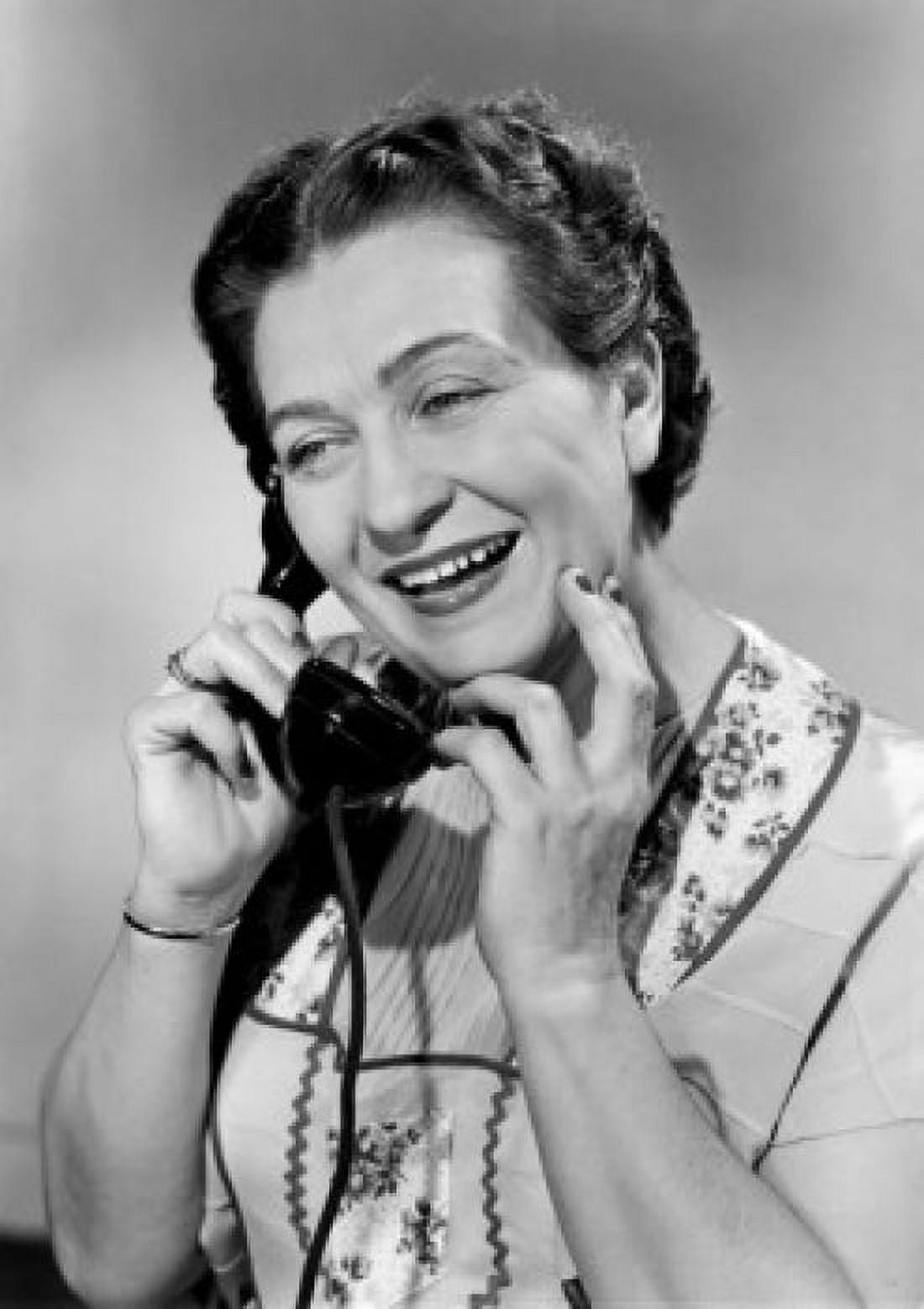 Woman using telephone in home Canvas Art - (24 x 36)