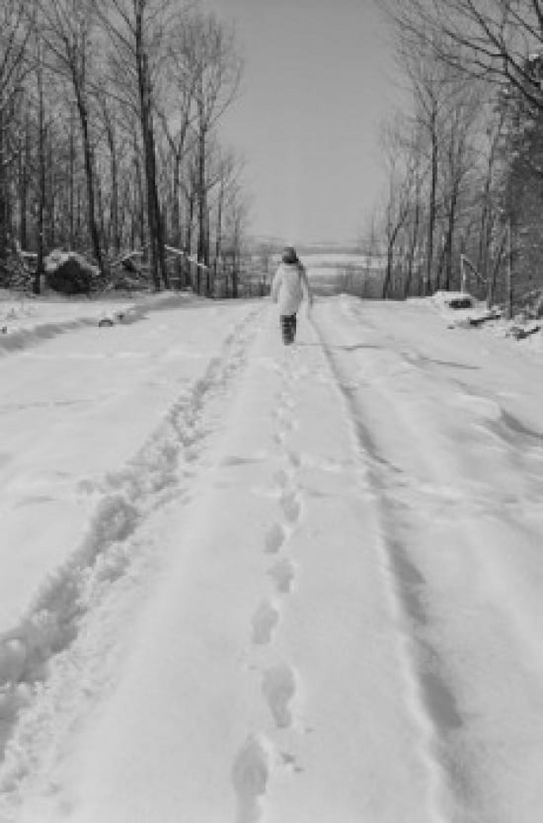 Woman walking on snow covered road Canvas Art - (18 x 24)