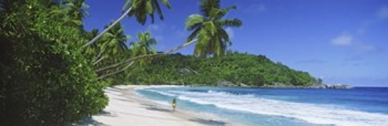 Woman walking on the beach Anse Takamaka Beach Mahe Island Seychelles Canvas Art - Panoramic Images (36 x 12)