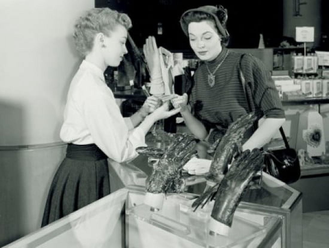 Woman watching gloves in shop Canvas Art -  (18 x 24)