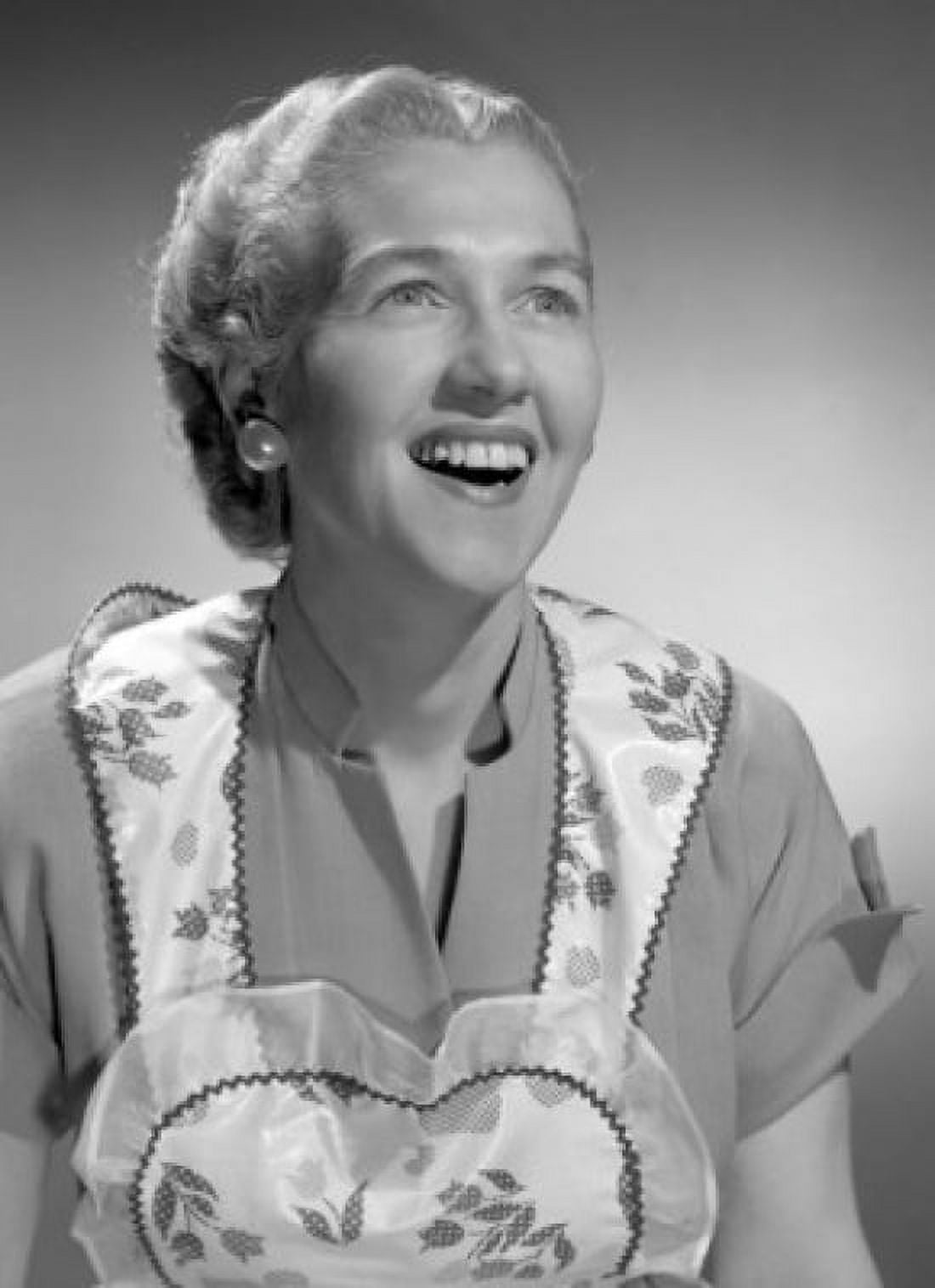 Woman wearing apron smiling Canvas Art - (18 x 24)