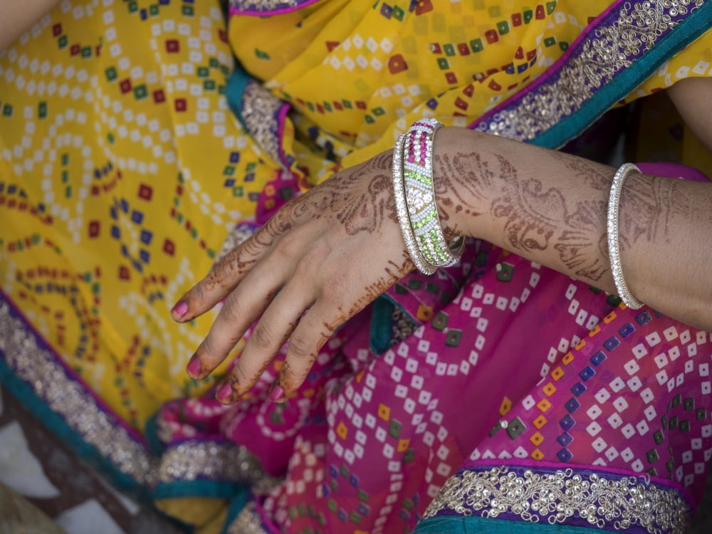 Woman with henna tattoo on her hand at Hare Krishna temple Juhu Mumbai Maharashtra India Canvas Art - Panoramic Images (12 x 16)