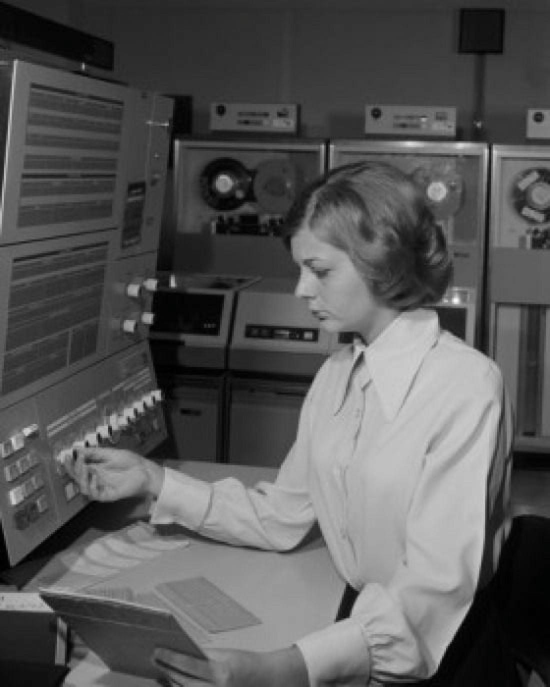Woman working in studio adjusting knobs Canvas Art - (24 x 36)