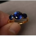 thumbnail image 1 of Women 2Ct Round Cut Blue Sapphire 3-Stone Wedding Ring 14K Yellow Gold Plated, 1 of 5