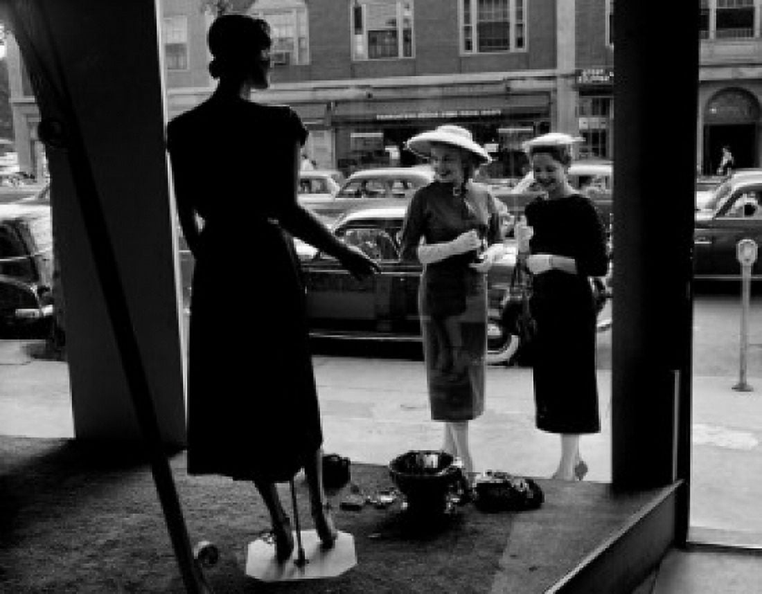 Women looking at window display Canvas Art - (24 x 36)