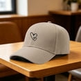 thumbnail image 1 of Women's Adjustable Heart Print Baseball Cap, Breathable Lightweight Dad Hat with Ponytail Opening, Summer Sun Protection Trucker Cap for Outdoor Daily Casual Wear Khaki, 1 of 4