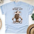 thumbnail image 1 of Women’s Christian Cowgirl T-Shirt – Be Salty & Stay Lit, Jesus Has Your Back Western Tee, Light Blue, Size XL, 1 of 6