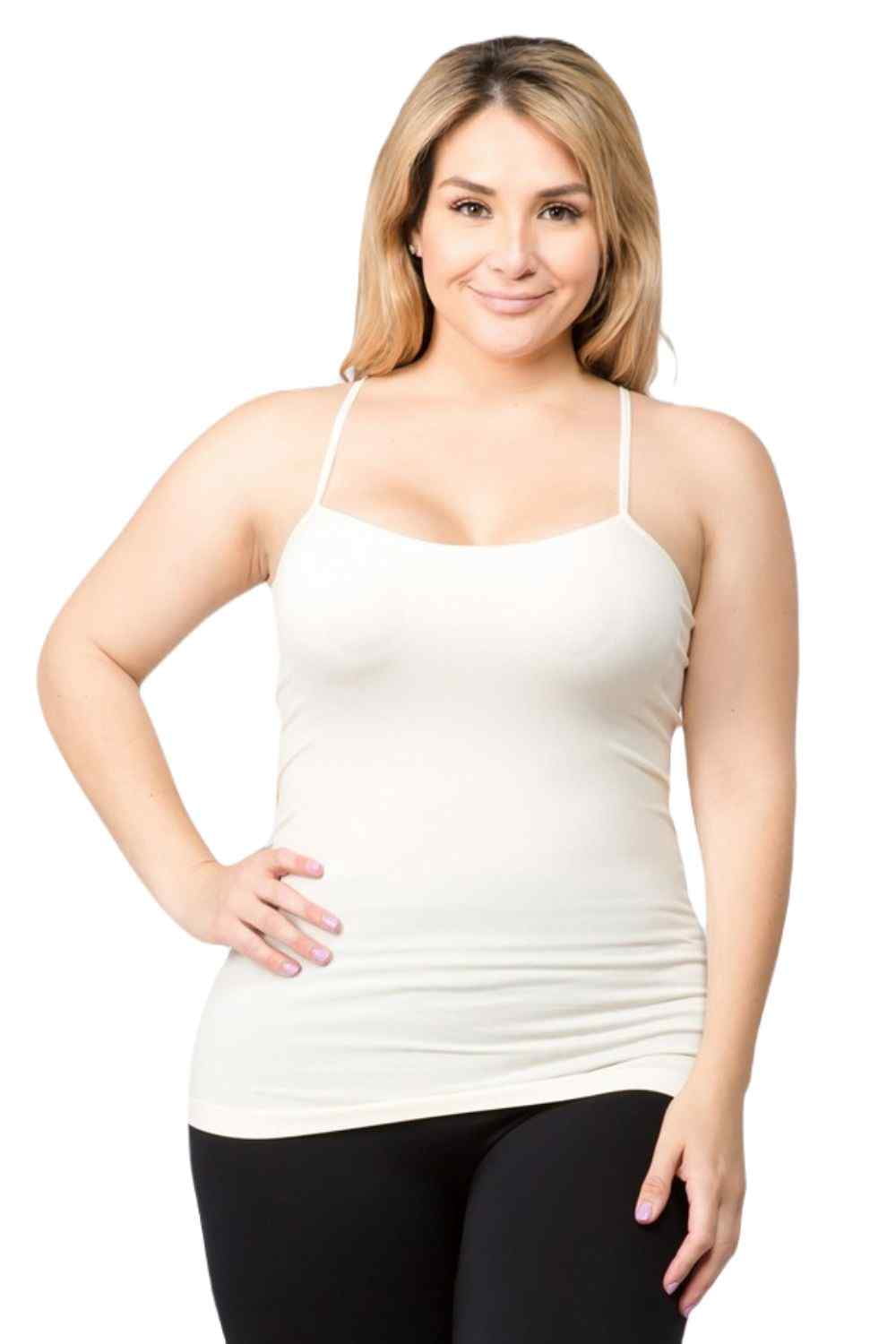 Women's Plus Size Seamless Criss-Cross Camisole. • Strappy detail on front  • Seamless design • Longline hem • Fits your body like a glove • Spaghetti  Straps • Ultra Soft • Stretchy