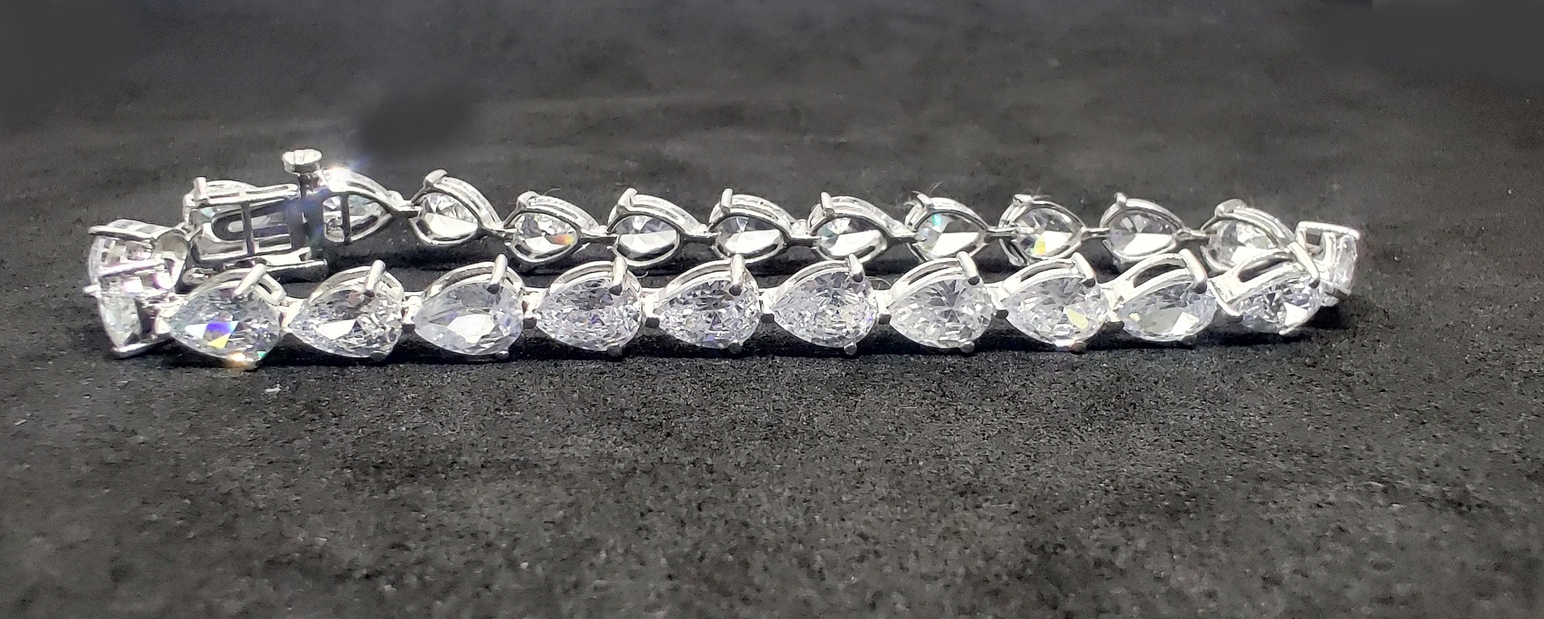 Women's Pear Shaped Diamond Tennis Bracelet in Sterling Silver, Length 6-9 Inches