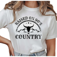 thumbnail image 1 of Women's Raised On 90's Country Retro Bull Skull Western Graphic Casual Tee Short Sleeve Round Neck Top White S-5XL, 1 of 5