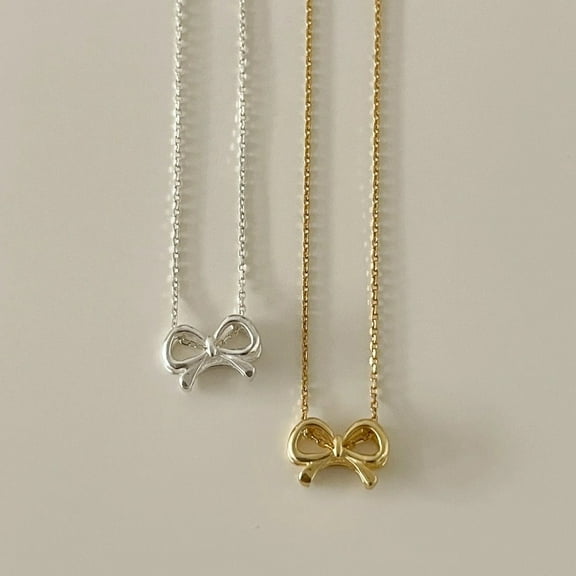 Women's S925 Sterling Silver Hollow-out Three-dimensional Bow Necklace