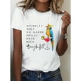 thumbnail image 1 of Women's Short Sleeve T-Shirt With Cotton Fabric In White Color Featuring A Parrot And Cocktail Graphic With Inspirational Quote By Jimmy Buffett - Perfect For Casual Wear And Beach Outfits, 1 of 4