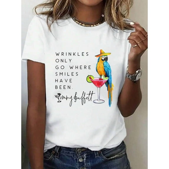 Women's Short Sleeve T-Shirt With Cotton Fabric In White Color Featuring A Parrot And Cocktail Graphic With Inspirational Quote By Jimmy Buffett - Perfect For Casual Wear And Beach Outfits