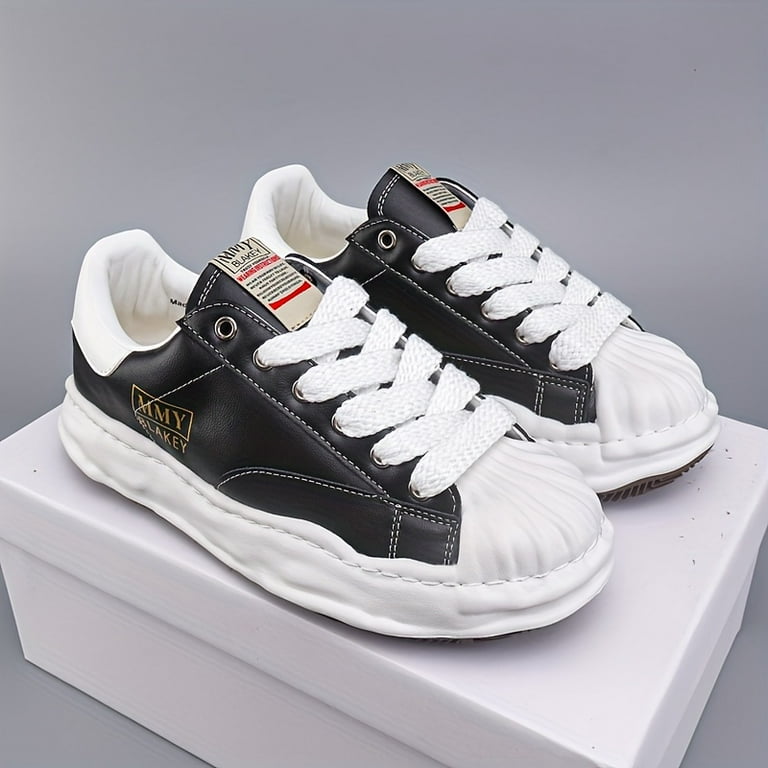 Shell toe sneakers on sale
