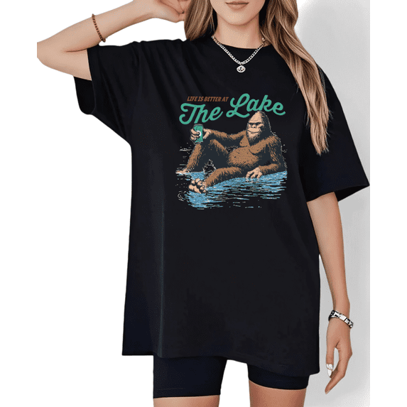 Women's Vintage Whimsical "Bigfoot At The Lake" Graphic Comfortable T Shirt Casual Short Sleeve Round Neck Top Black S-5XL