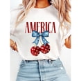 thumbnail image 1 of Womens Flag Cherry Bow Print Tshirts Patriotic Graphic Tees Casual Short Sleeve Tops Cotton Shirts for Holiday Outfit White,M, 1 of 6