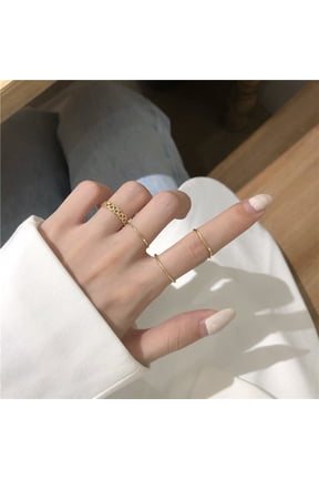Womens Korean Style Wave Twist Ring Set: Four-Piece Alloy Geometric Rings, Individually Packed for Gifting and Everyday Wear