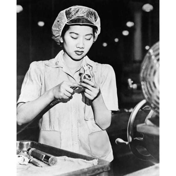 Wong Ruth Mae Moy Working On An American Aircraft Engine Part. She Is A Young Chinese Women Who Survived The Canton