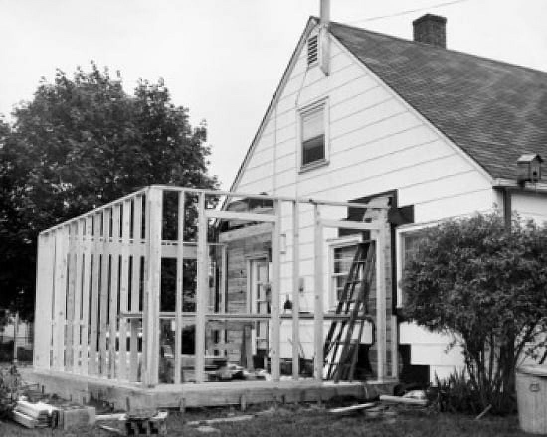 Wood construction frame in front of a house Canvas Art - (18 x 24)