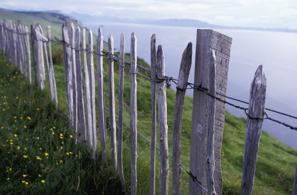 Wooden Fence On Hillside By Sea Canvas Art - Sasha Gusov Design Pics (19 x 12)