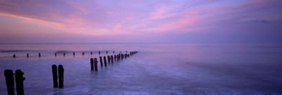 Wooden Posts In Water Sandsend Yorkshire England United Kingdom Canvas Art - Panoramic Images (18 x 6)
