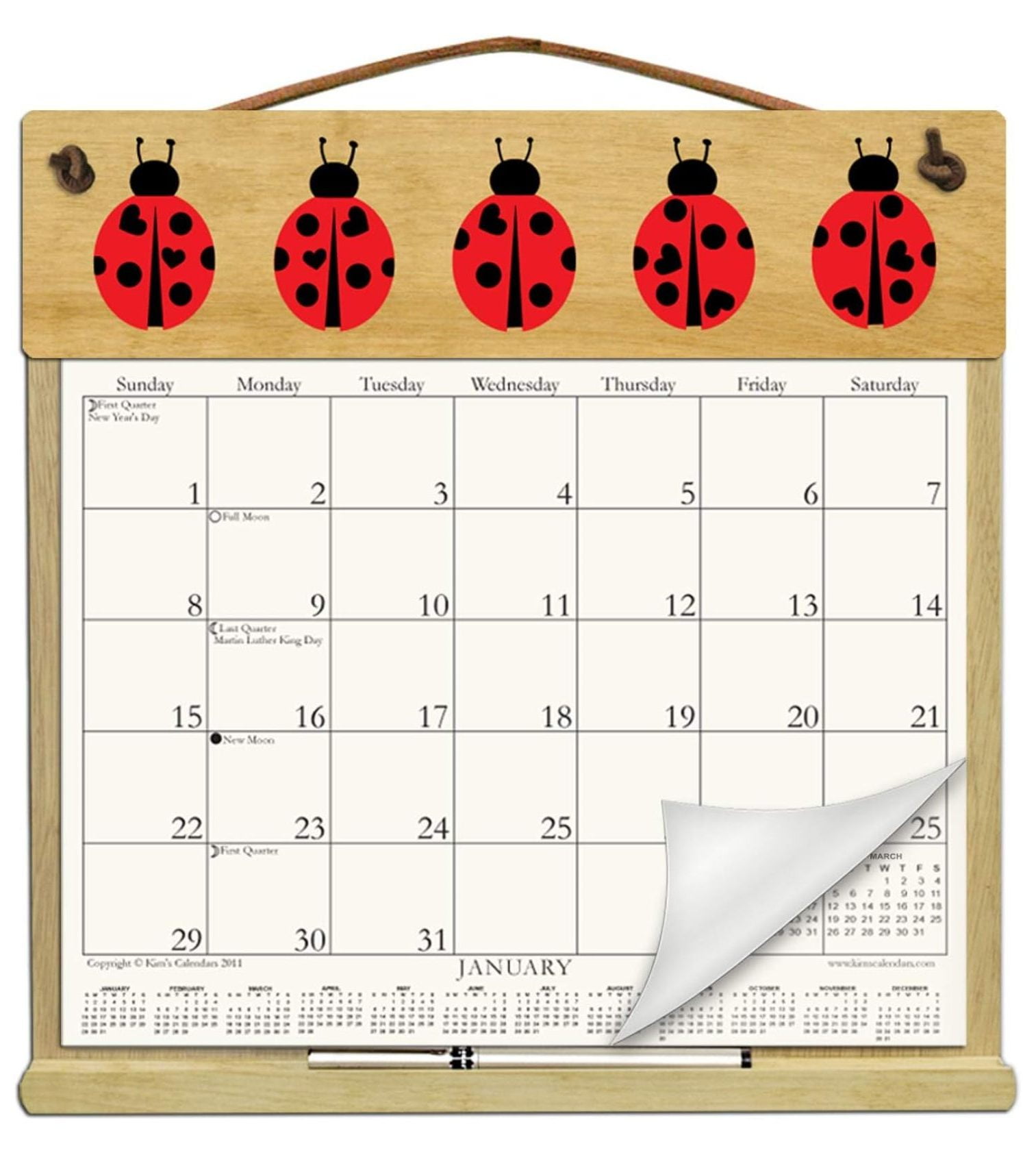 Wooden Refillable Calendar Holder filled with a 2025 calendar and ...