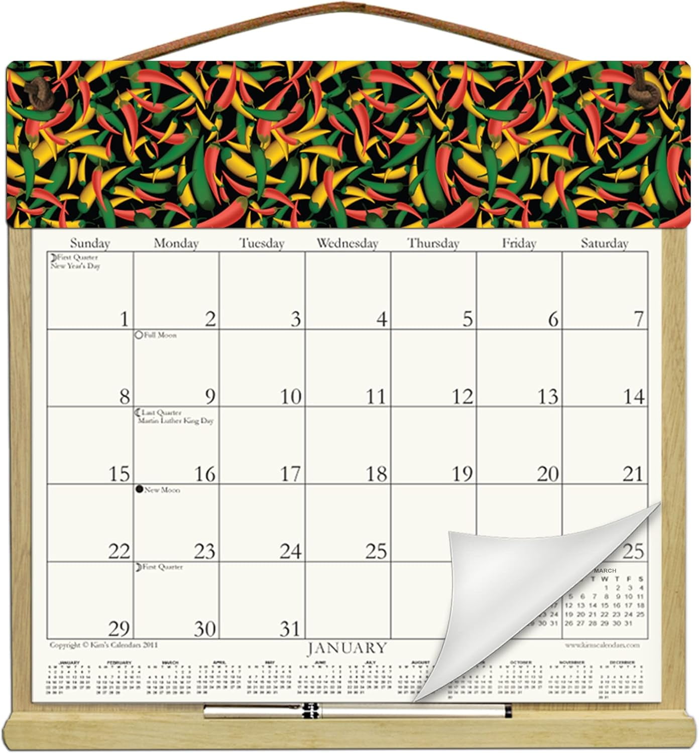Wooden Refillable Calendar Holder filled with the a 2025 calendar and includes an order form
