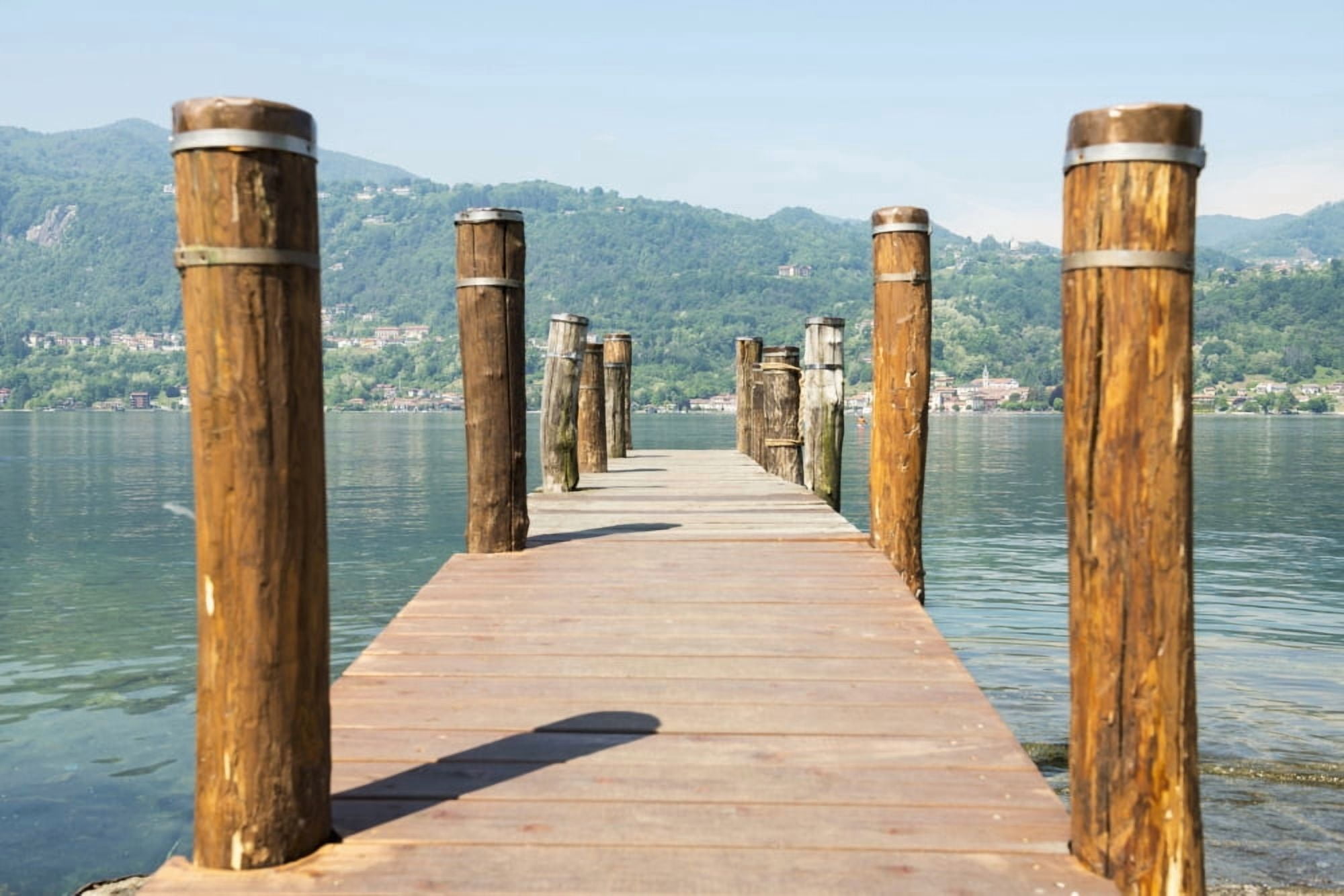 Wooden dock and posts on Lake Orta Orta Piedmont Italy Canvas Art - Mats Silvan Design Pics (19 x 12)