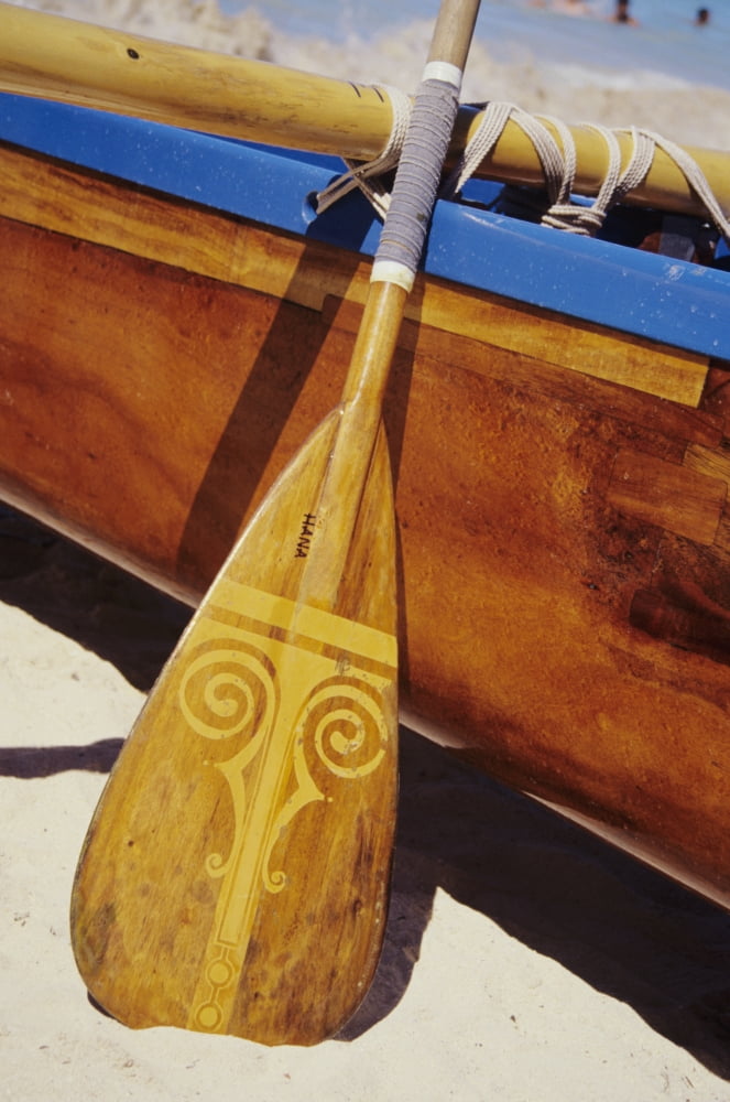 Wooden paddle and outrigger canoe on beach Canvas Art - Joss Descoteaux Design Pics (22 x 34)
