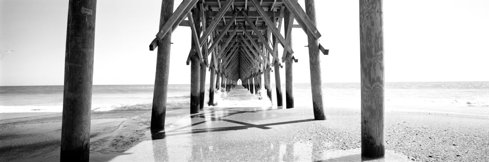 Wooden post under a pier on the beach North Carolina USA Canvas Art - Panoramic Images (27 x 9)
