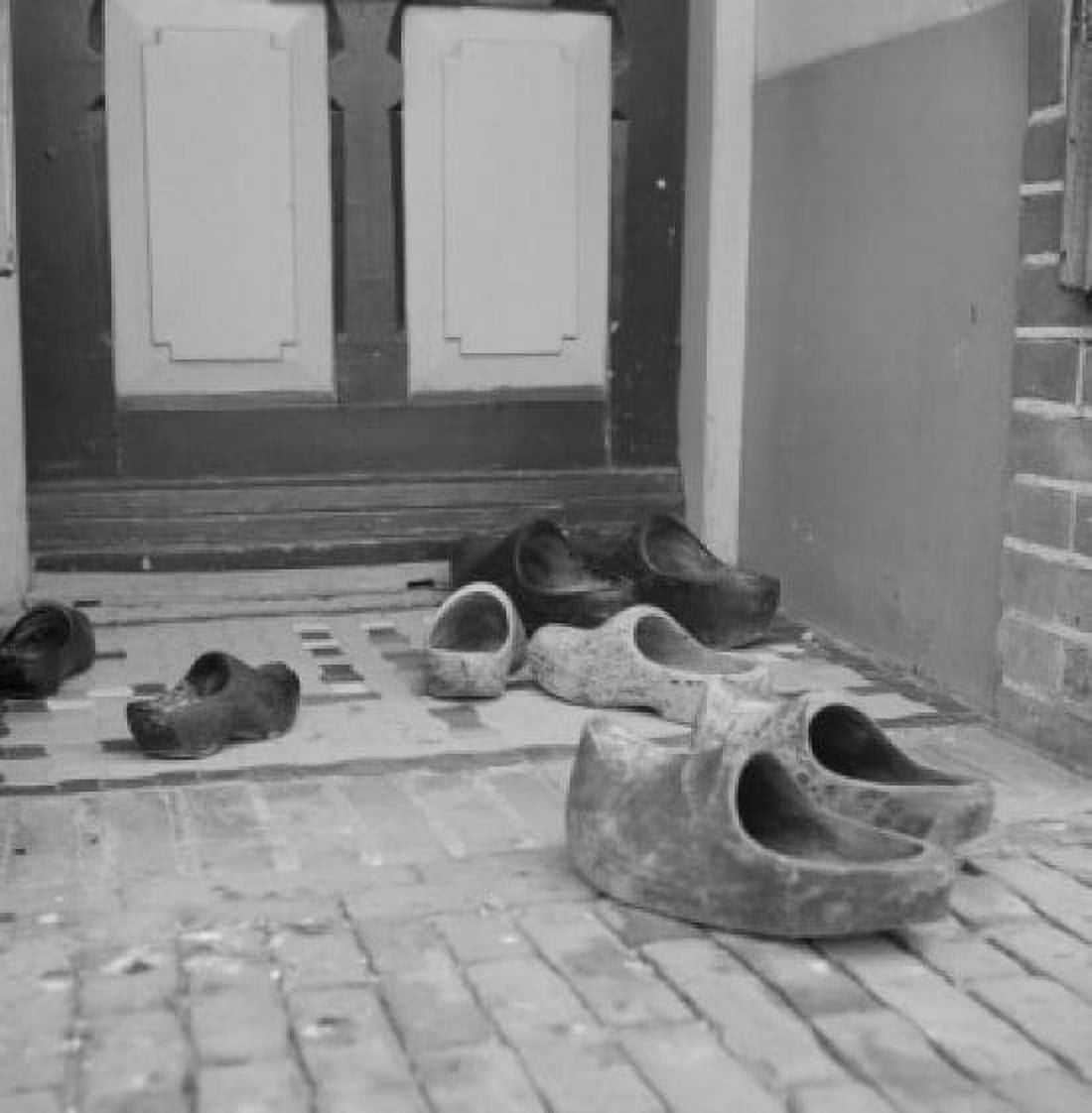 Wooden shoes in front of dutch doorway Canvas Art - (18 x 24)