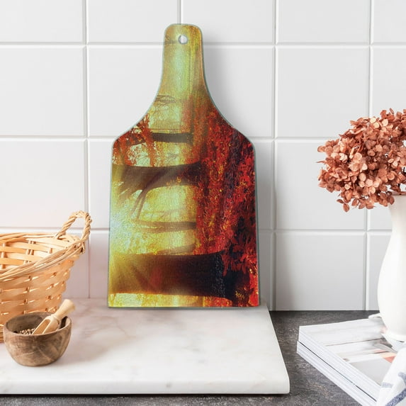 Woodland Cutting Board, Sun Beams Through Misty Old Forest in Fall Season Morning View Dreamy Picture, Decorative Tempered Glass Cutting and Serving Board, Wine Bottle Shape, Yellow Red, by Ambesonne