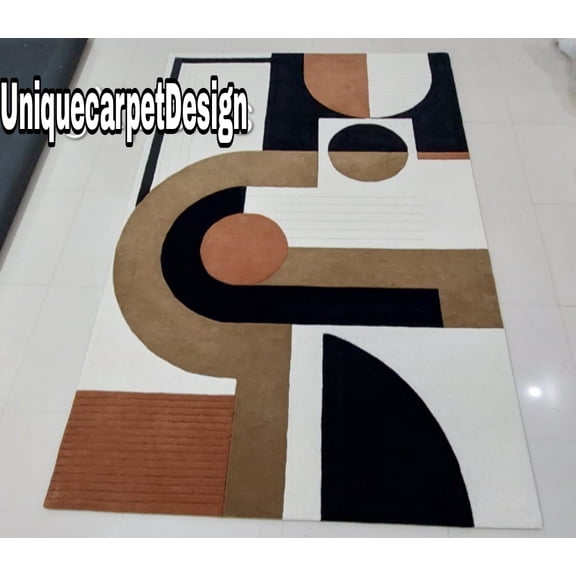 Wool is a highly durable, natural fiber that is soft, resilient, and warm.Tufted woolen rugs with a pile cut and loop design.