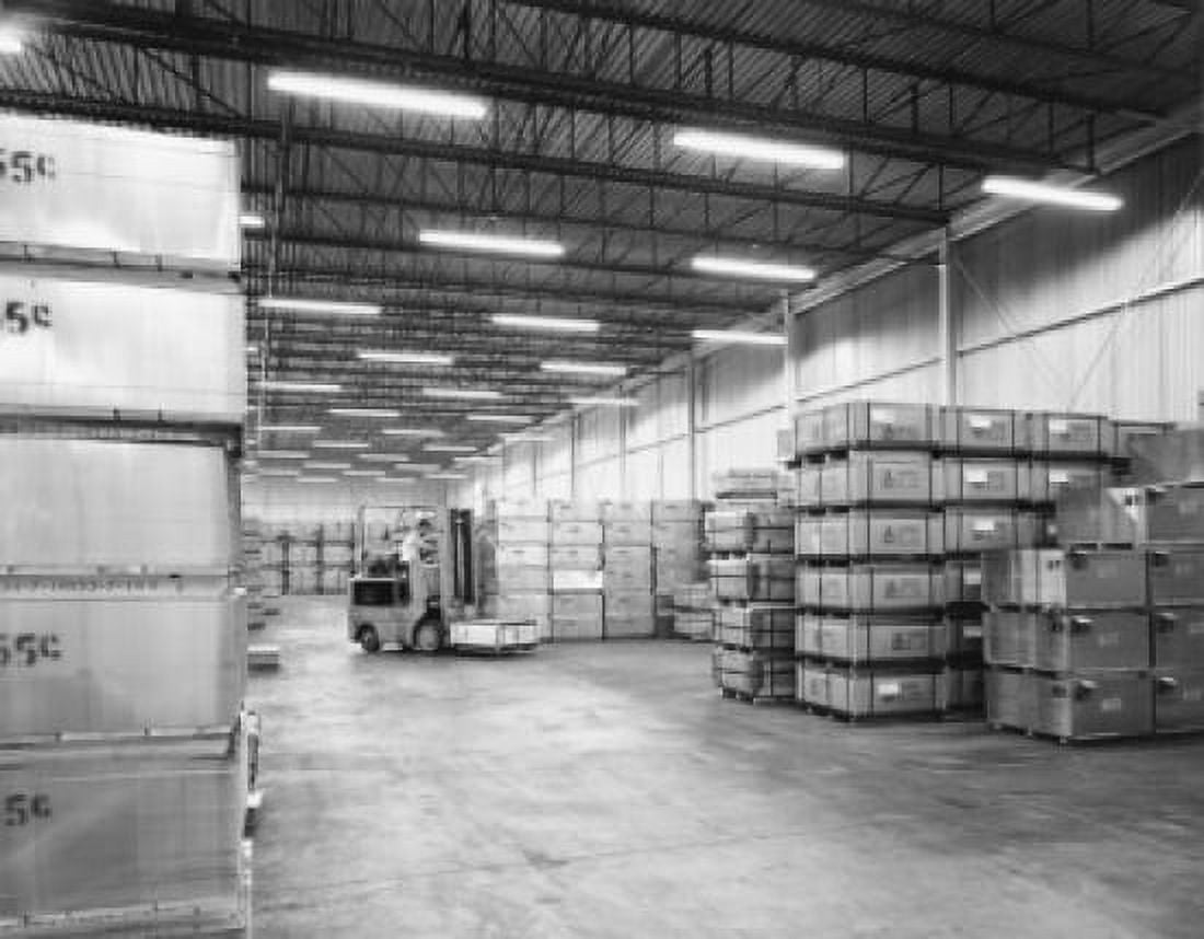 Worker operating a forklift in a warehouse Canvas Art - (18 x 24)