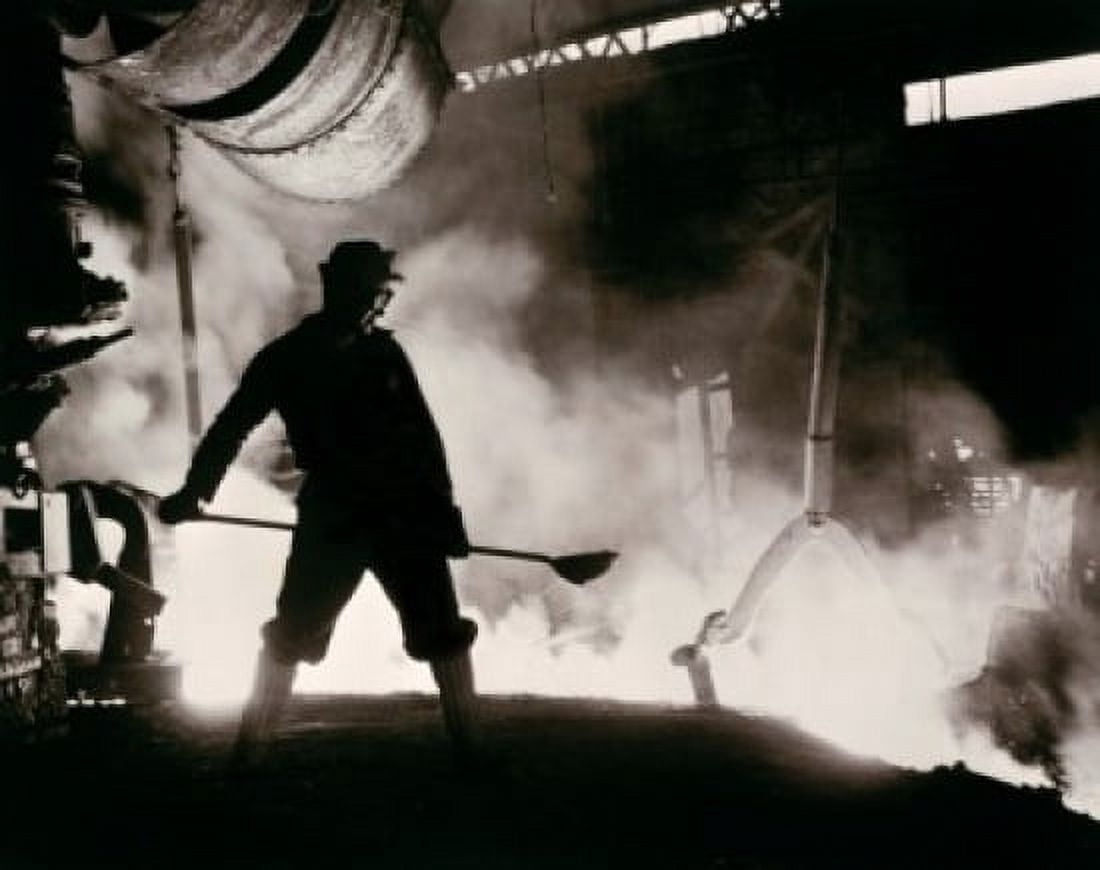 Worker stoking furnace in a steel foundry Canvas Art - (24 x 36)