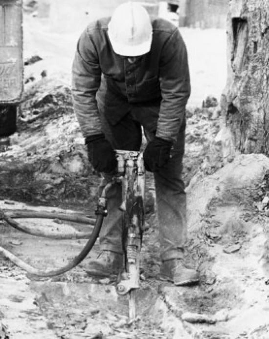 Worker using a pneumatic drill Canvas Art - (18 x 24)