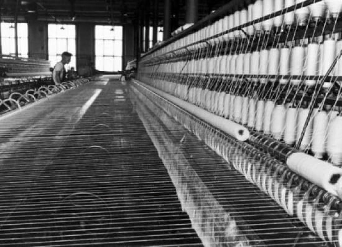 Worker working on a mule spinning machine in a textile factory Canvas Art - (24 x 36)