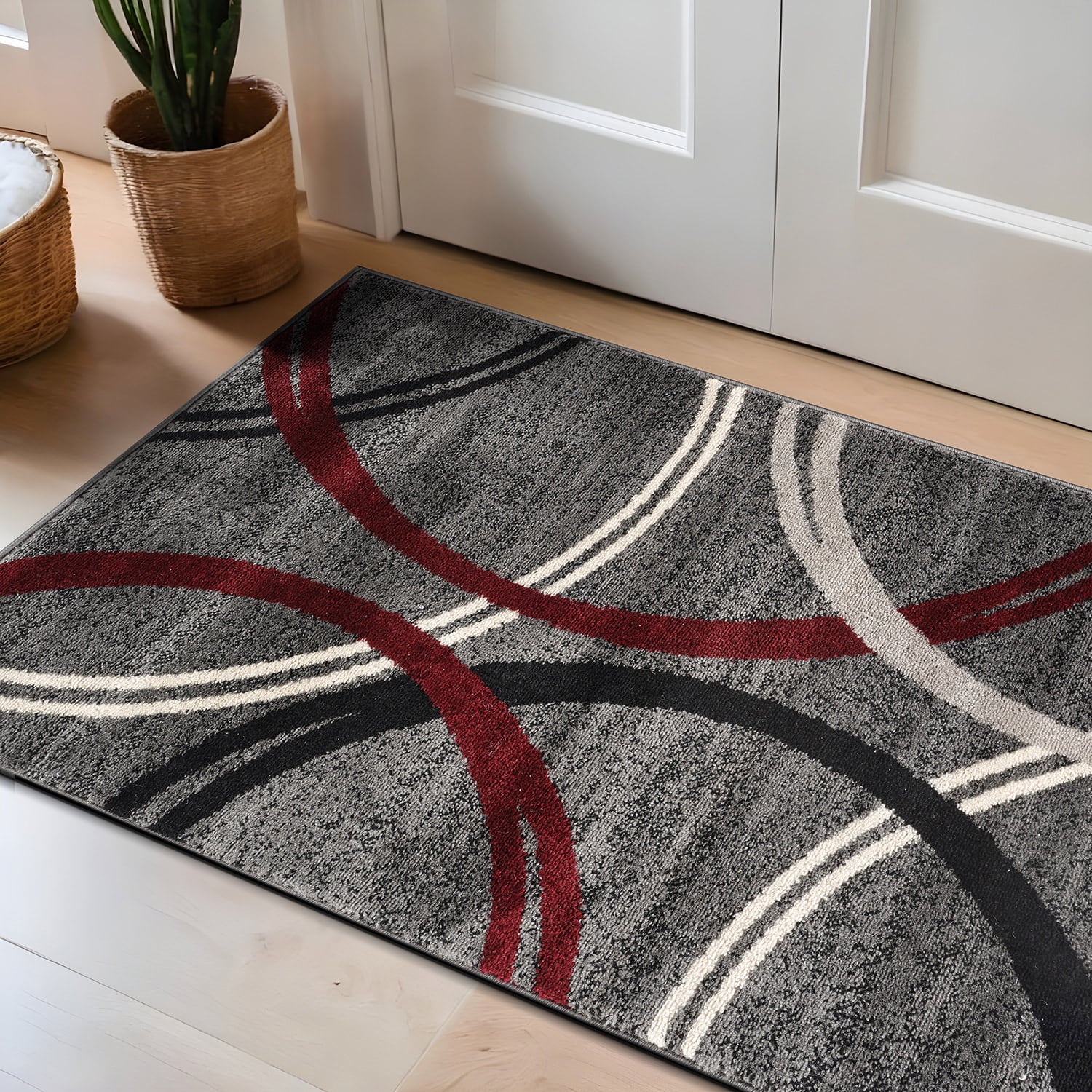 5' x 7' Red and Gray Abstract Synthetic Area Rug
