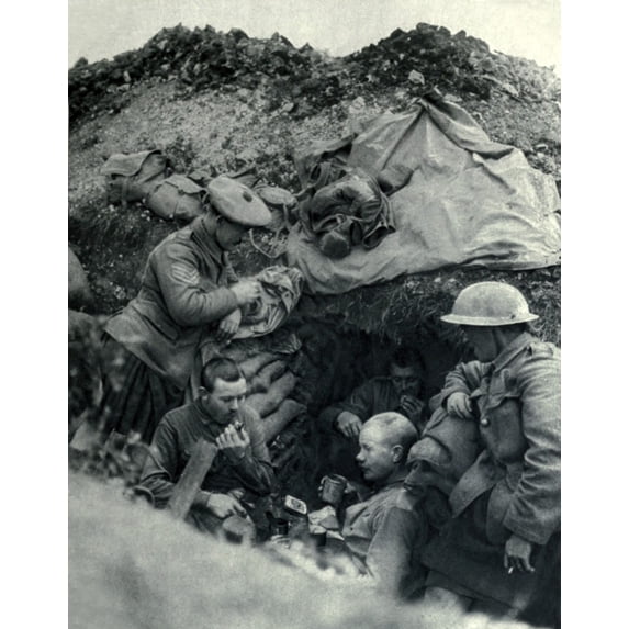 World War 1. Somme Offensive. British Soldiers Eating Their Rations In A Trench. Their Meal Included Canned Meats Such