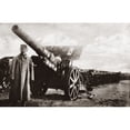 thumbnail image 1 of World War I Heavy Gun. None Of The French Commissioners Standing Beneath The Long Bore Of A Surrendered German Gun., 1 of 3
