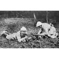 thumbnail image 1 of World War I Machine Gun. Nfrench Machine Gun With A Semi-Circular Loading Device During World War I. Photograph, 1 of 3
