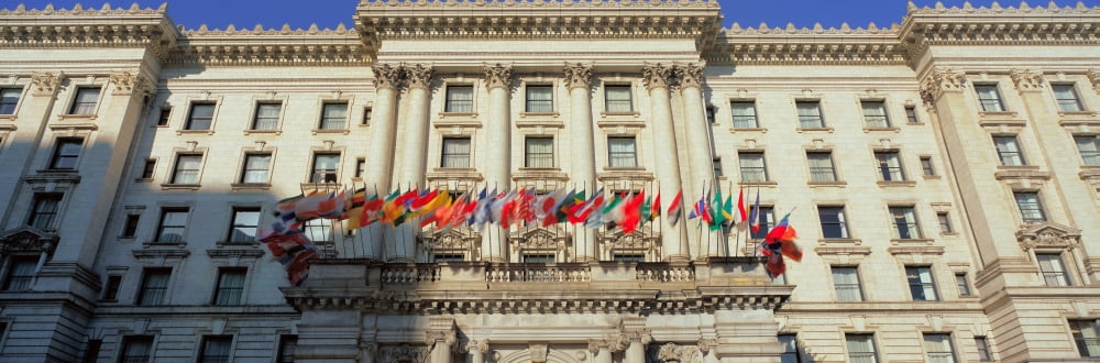World flags blow in the breeze in front of the Fairmont Hotel on San Franciscos Nob Hill San Francisco California Canvas Art - Panoramic Images (27 x 9)
