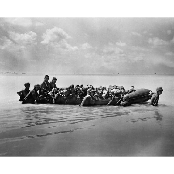 Wounded Marines In Rubber Boats Are Towed To Larger Vessels For Transport To Base Hospitals. There Were Among The 2