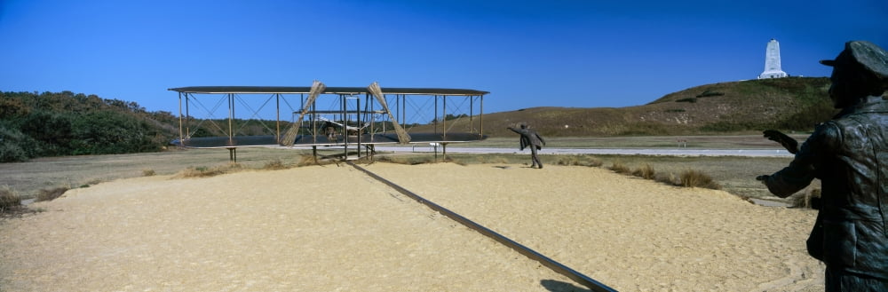 Wright Flyer sculpture at Wright Brothers National Memorial Kill Devil Hills Kitty Hawk Outer Banks North Carolina USA Canvas Art - Panoramic Images (27 x 9)