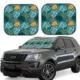 thumbnail image 1 of Xecao Tropical Leaves for Foldable Car Sun Shades (2-Pack) offer sun protection with an easy-fold design for convenient windshield shading., 1 of 7